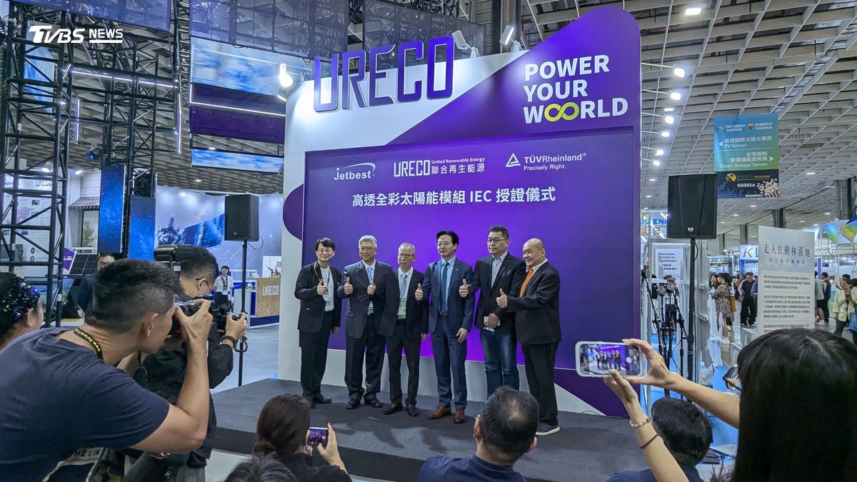 Weichun Li, third from the right, senior vice president of global power electronics at TÜV Rheinland, stands among exhibitors and visitors at Energy Taiwan on Wednesday, Oct. 16, 2026, in Taipei. (Courtesy of TÜV Rheinland)