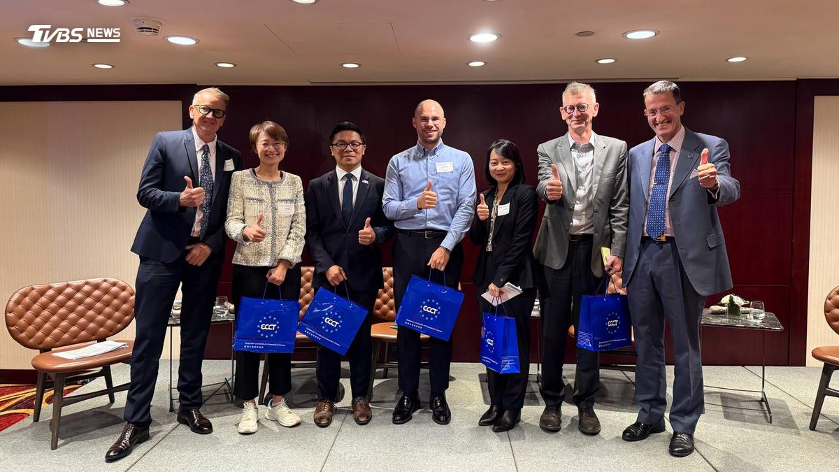 Participants in the ECCT's panel discussion on Taiwan's upcoming local elections stand on stage alongside Tim Berge, left, general manager of ICRT, and ECCT CEO Freddie Höglund, right, in Taipei on Tuesday, Oct. 27, 2026. (Courtesy of ECCT/Facebook)